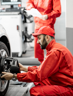 auto-mechanics-making-wheel-alignment-at-the-car-s-2021-12-09-01-20-39-utc-1.png